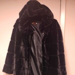A faux fur coat.